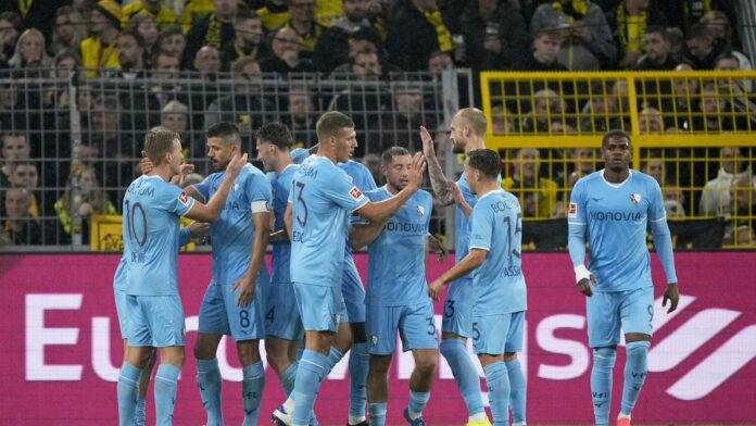 Serhou Guirassy scores twice in Dortmund's 4-2 comeback win over local rival Bochum