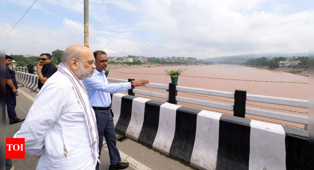 Shah tours flood-hit Jammu, assures assistance from Centre | India News